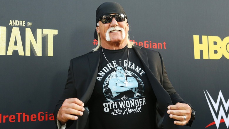 Hulk Hogan showing off his Andre The Giant shirt