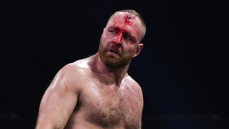Jon Moxley bleeding from his forehead