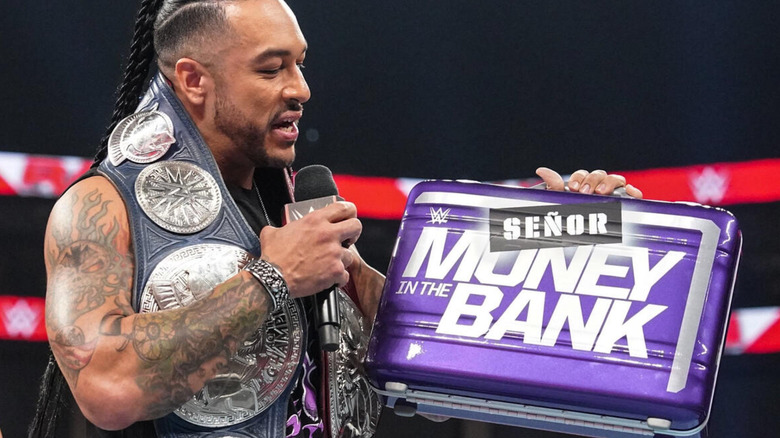 Damian Priest with the Money In The Bank briefcase