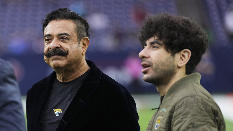 Shad Khan and Tony Khan on field