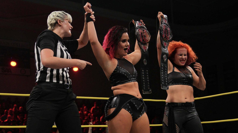 The Coven celebrating in the ring