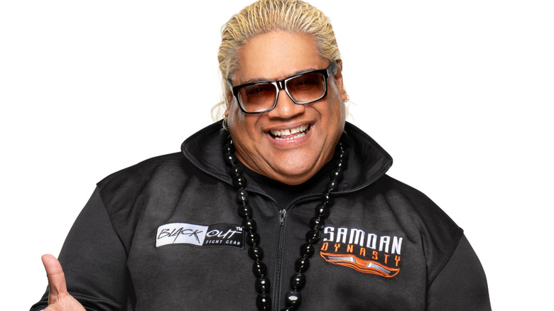 rikishi posing for photo