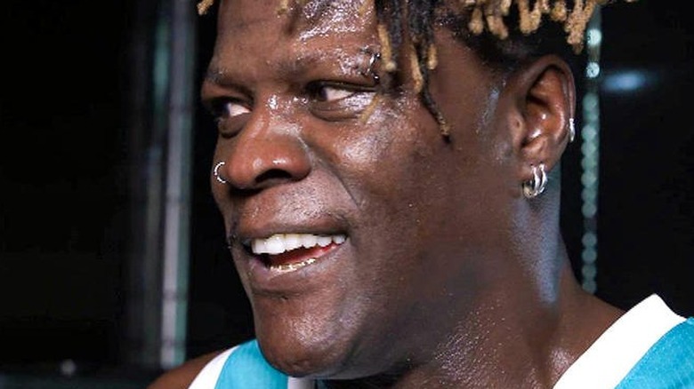 R-Truth looking away