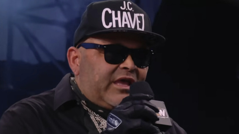 Konnan speaking in the ring