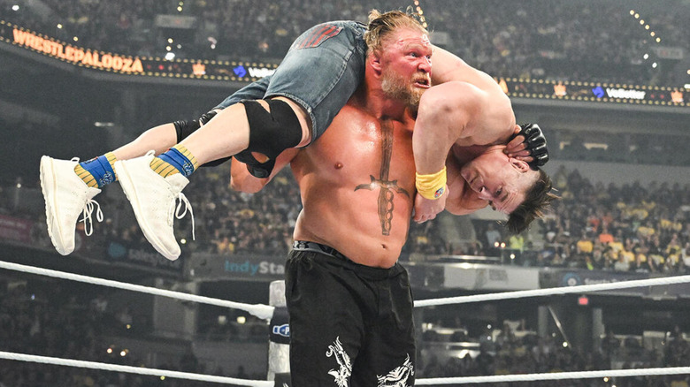 Brock Lesnar has John Cena on his shoulders