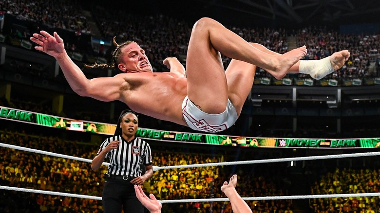 Matt Riddle in the midst of delivering a senton splash