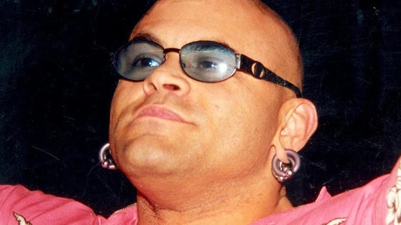 Konnan posing, smiling