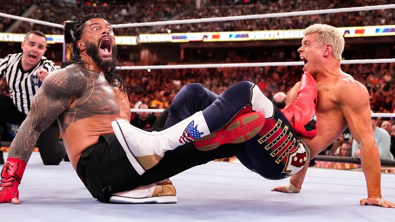 Roman Reigns wrestling Cody Rhodes