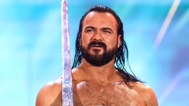 Drew McIntyre carrying sword