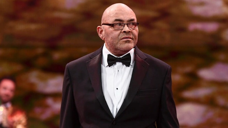 Konnan walking to the ring