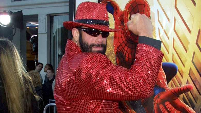 Randy Savage poses on red carpet