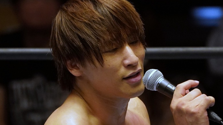 Kota Ibushi talking into a microphone