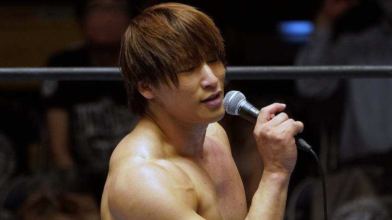 Kota Ibushi speaking into a microphone