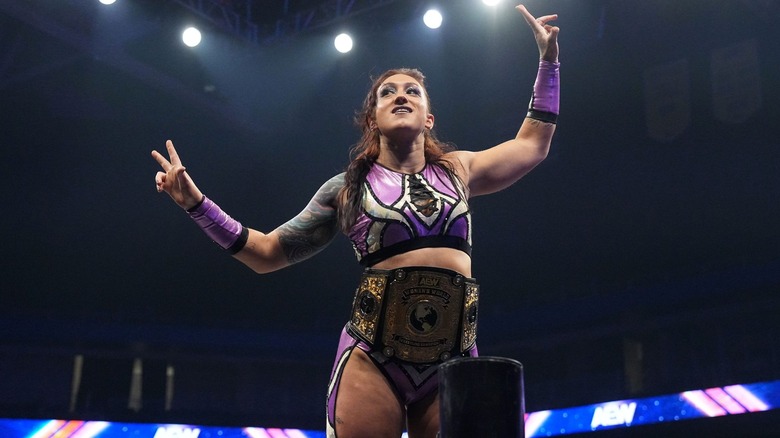Kris Statlander makes her entrance with the AEW Women's World Championship.