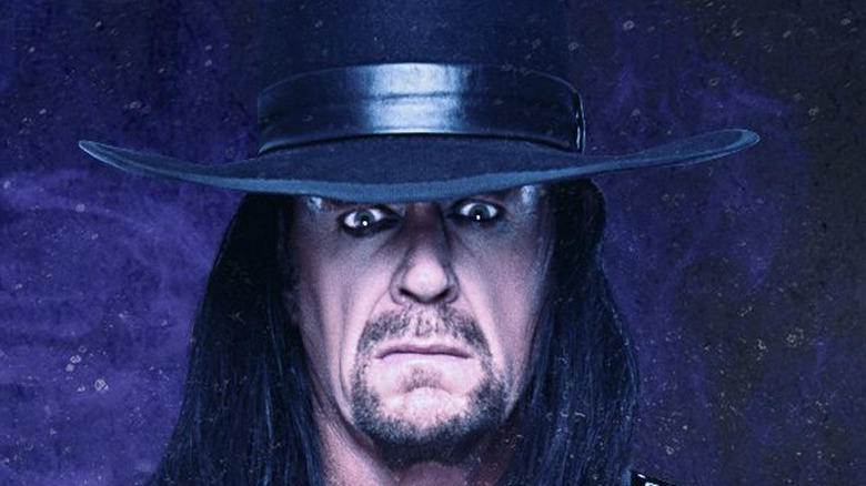 Undertaker in purple fog