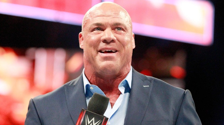 Kurt Angle holding a microphone