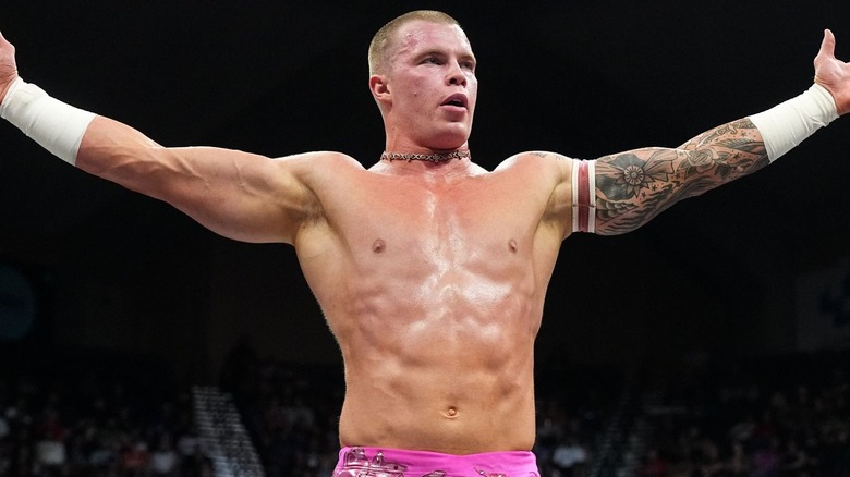 Kyle Fletcher outstretching his arms