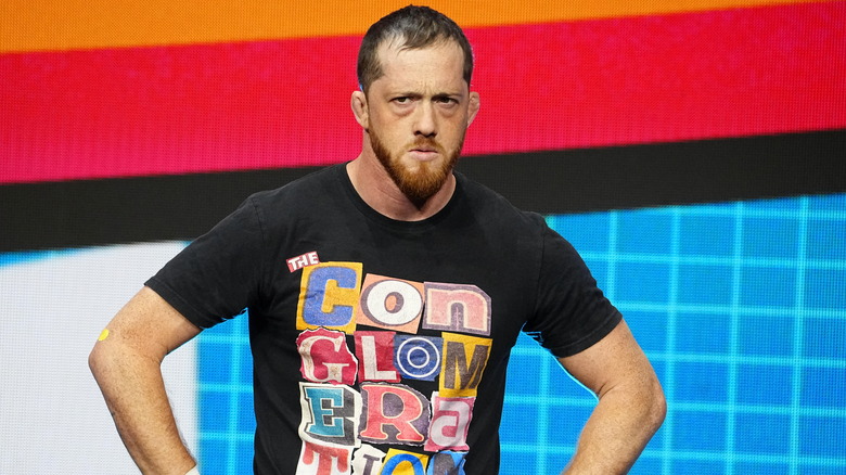 Kyle O'Reilly looks disapprovingly down to the ring before a match on 