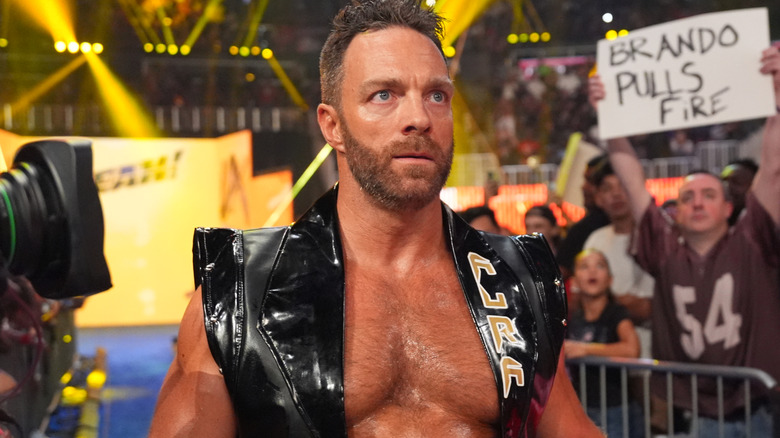 LA Knight wearing a black vest