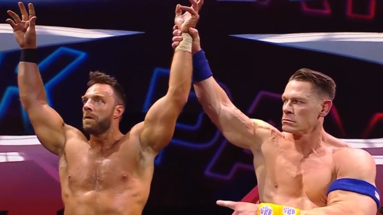 John Cena raises LA Knight's hand