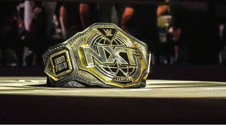 The NXT Championship sits vacant in the ring, a spotlight shining on it after Oba Femi vacated the gold at New Year's Evil.