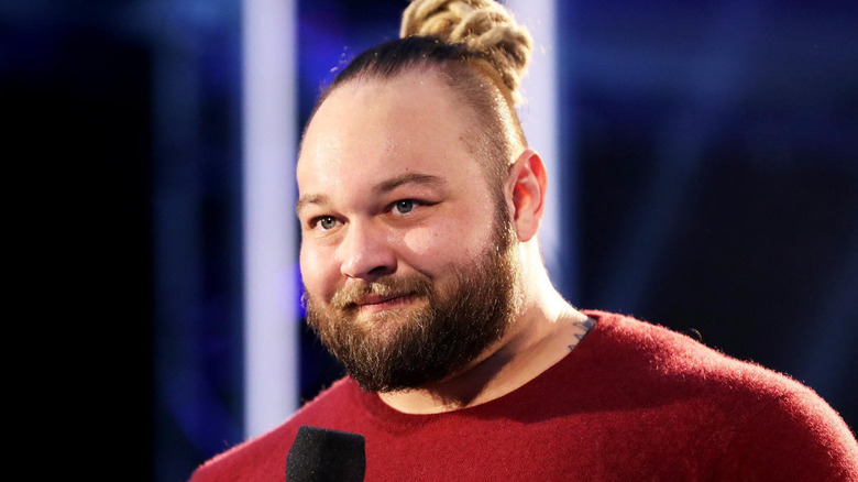 Bray Wyatt talking into a microphone