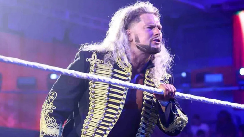 Lexis King leaning against the ring ropes