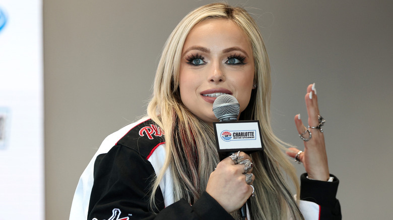 Liv Morgan with a microphone