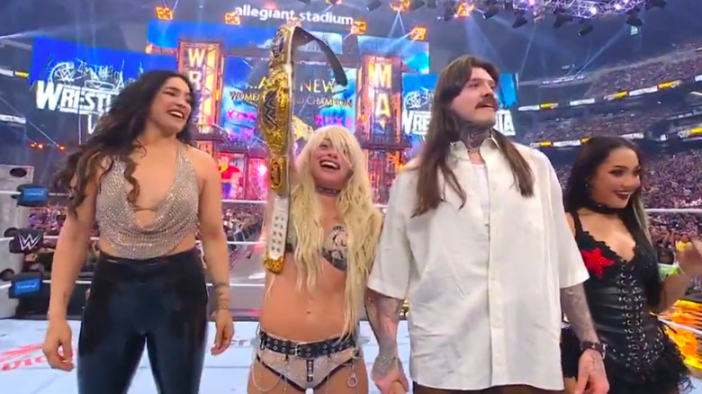 Liv Morgan celebrates her title win with Judgment Day