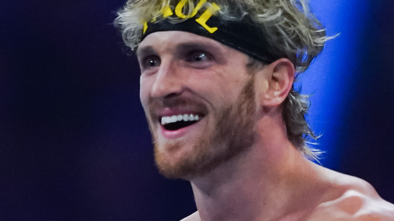 Logan Paul eyes wide smiling