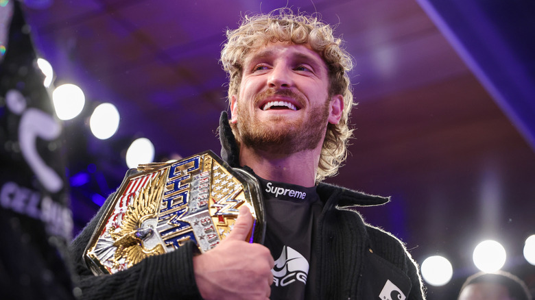 Logan Paul poses with the US Title