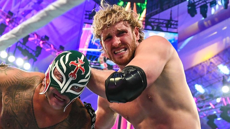 Logan Paul wrestling Rey Mysterio