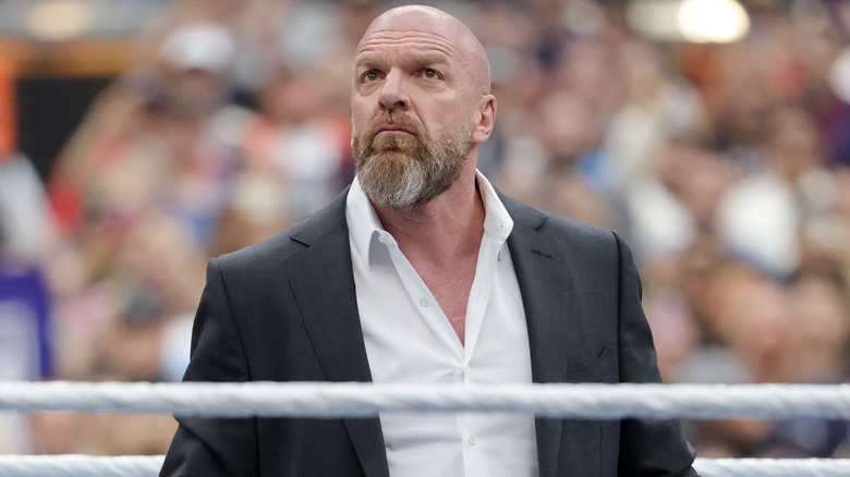 WWE CCO Triple H takes in the admiration from the crowd before welcoming them to WrestleMania