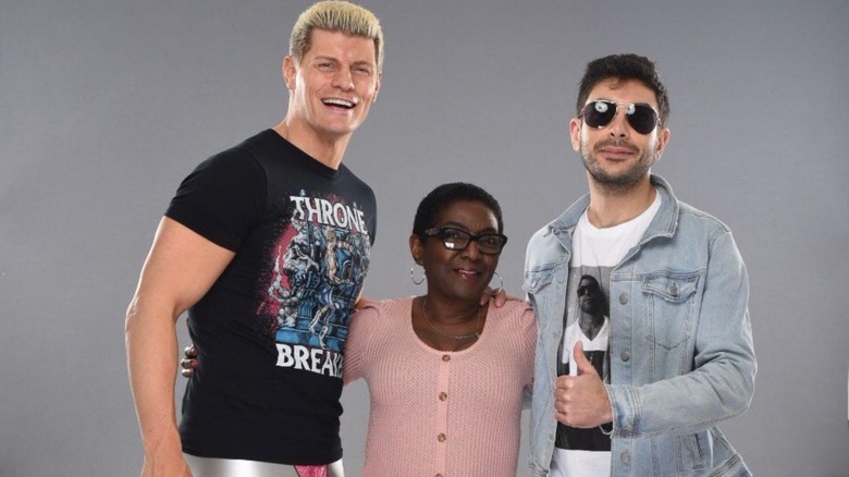 Sandra Gray with Cody Rhodes and Tony Khan