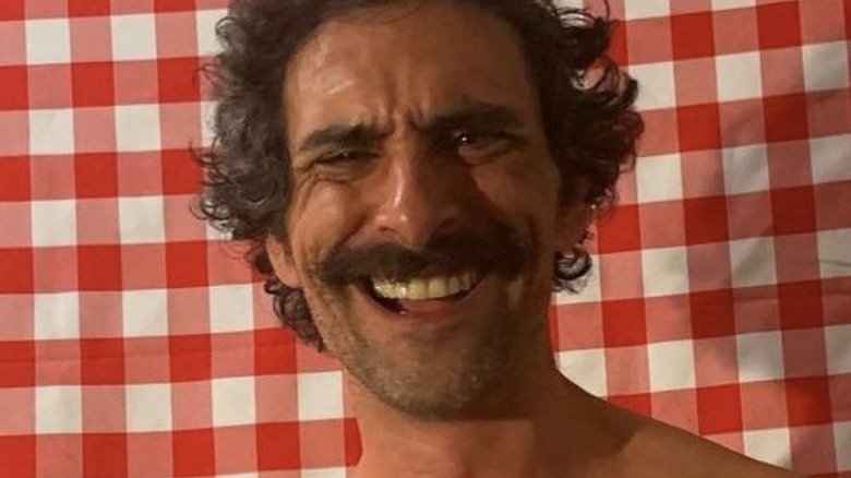 Luigi Primo smiles