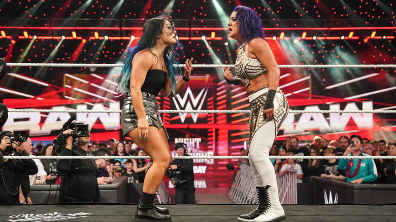 Lyra Valkyria and Bayley in the ring