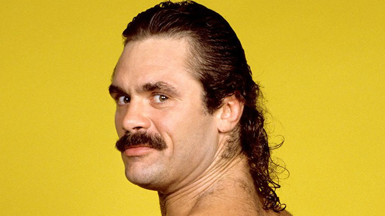 Rick Rude posing for a photo