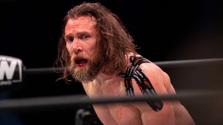 Bryan Danielson with KT Tape on his left shoulder during his last singles match