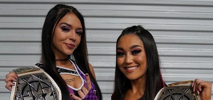 Cora Jade and Roxanne Perez with the NXT Women's Tag Team Titles