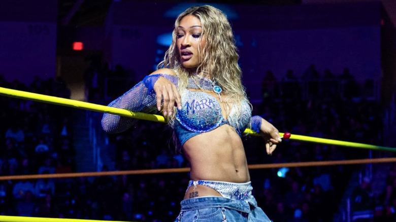 Mara Sade leaning against the ring ropes