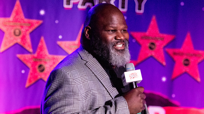 Mark Henry holds mic