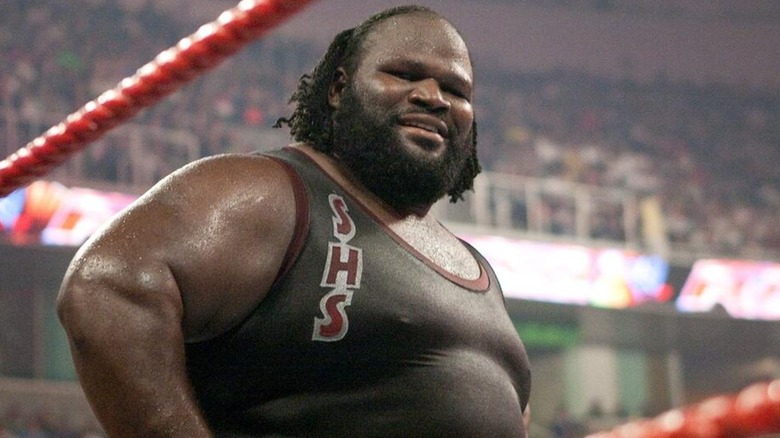 Mark Henry in ring smiling at the camera during an episode of 