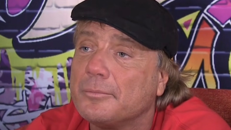 Marty Jannetty wearing a black cap