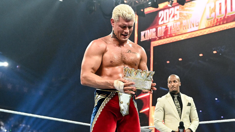 Cody Rhodes holding the King of the Ring crown