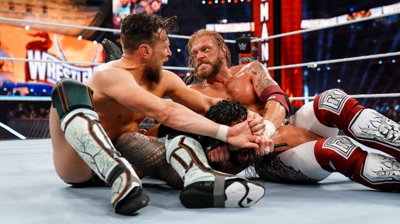 Daniel Bryan, Roman Reigns, and Edge at WWE WrestleMania 37
