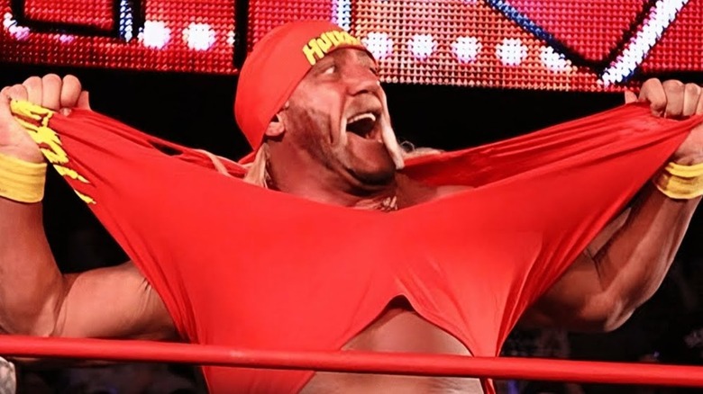 Hulk Hogan tearing his shirt in the ring