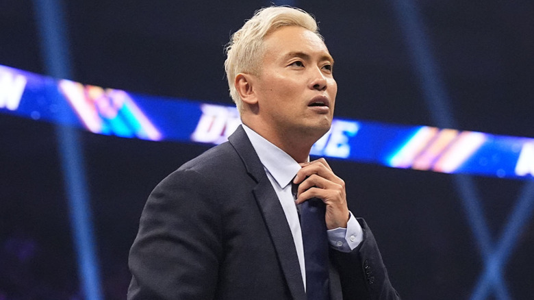 Kazuchika Okada adjusting his tie