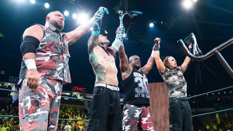 Bubba Ray Dudley, Jeff Hardy, D-Von Dudley, and Matt Hardy stand in the ring in celebration following their tables match at Bound for Glory 2025.