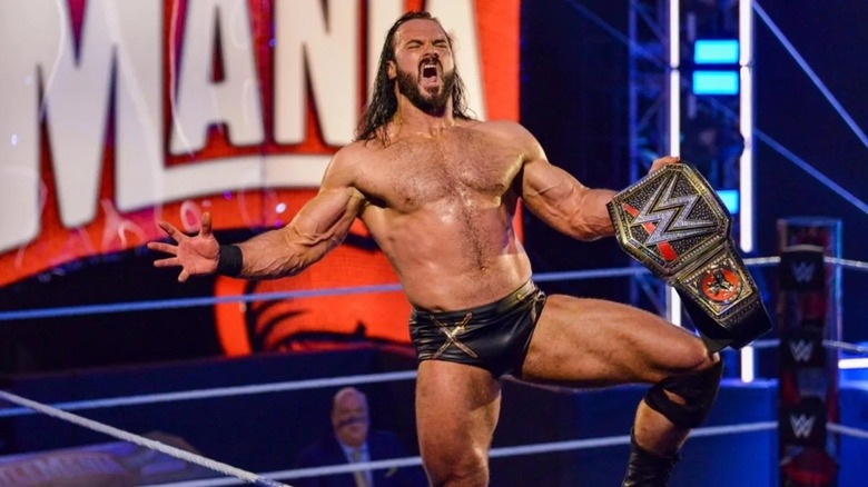 Drew McIntyre celebrating his WWE Championship win