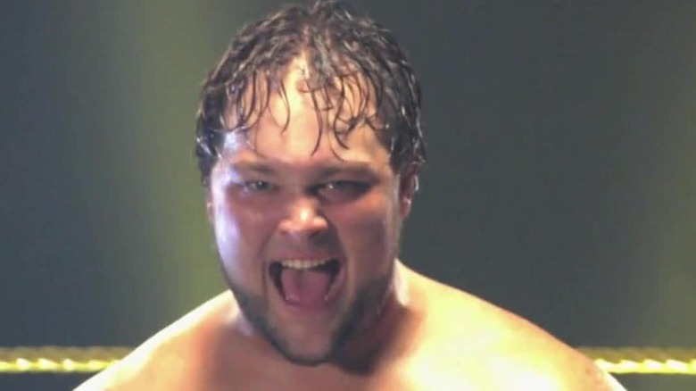 Husky Harris posing in WWE